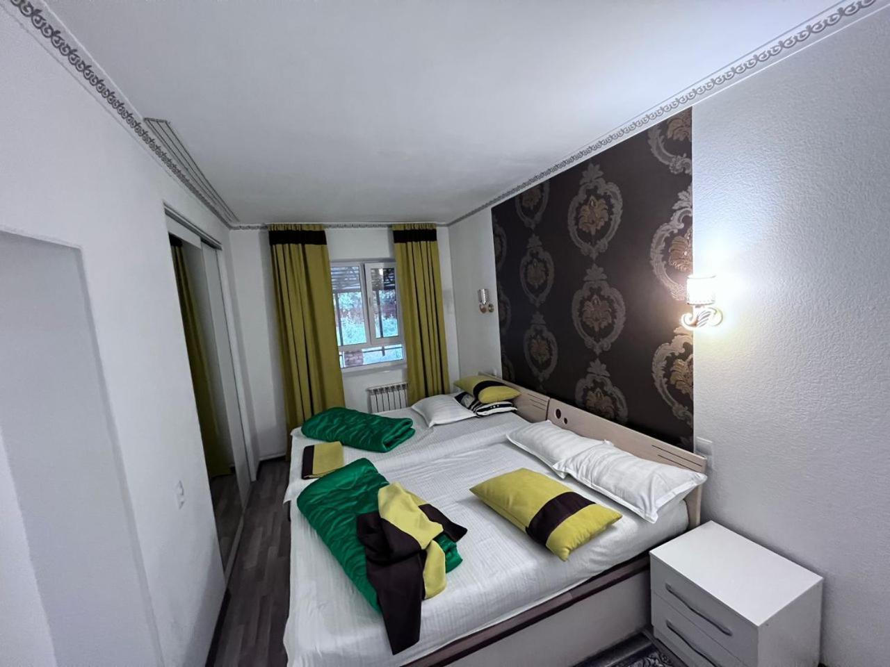 Turan Guesthouse คาราโคล ภายนอก รูปภาพ