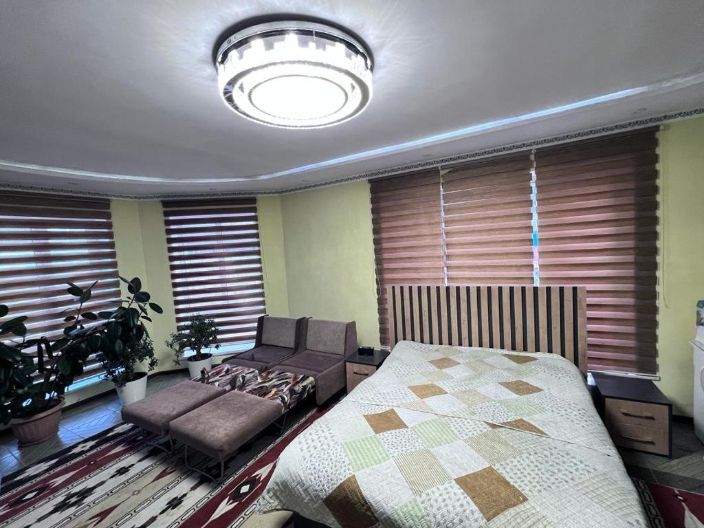 Turan Guesthouse คาราโคล ภายนอก รูปภาพ