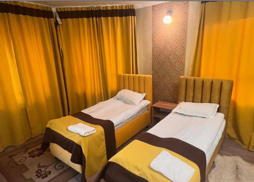 Turan Guesthouse คาราโคล ภายนอก รูปภาพ